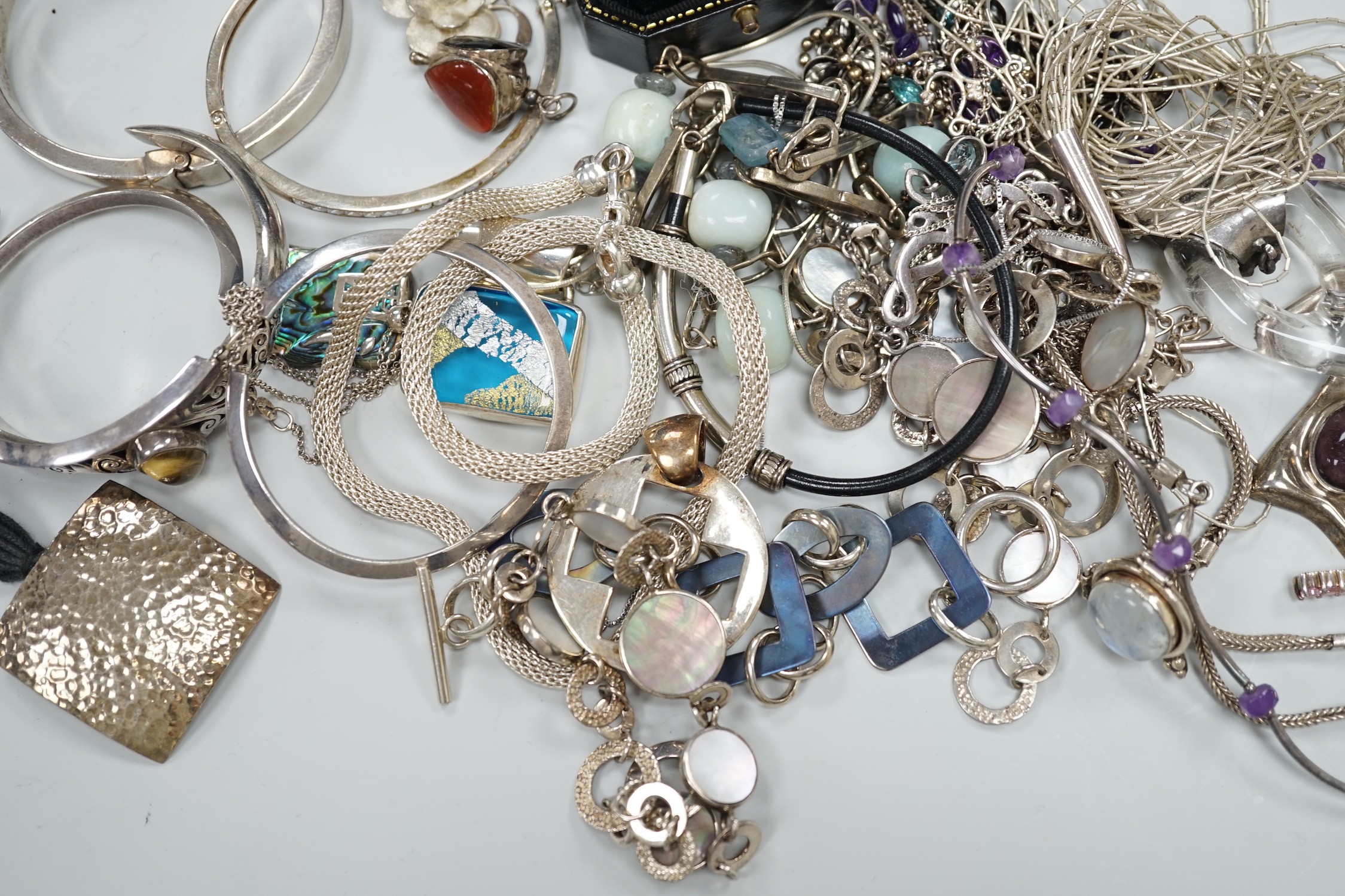A quantity of assorted jewellery including 925 and white metal bracelets, necklaces, pendants, bangles ring etc.